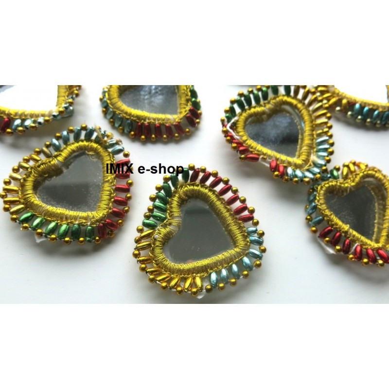 Tribal large sewing mirrors decorated in the shape of a heart